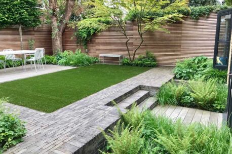 septima-olijf-london-family-garden-uk NGWF Taupe SeptimA 215x52x70 mm getrommeld 85st/m²